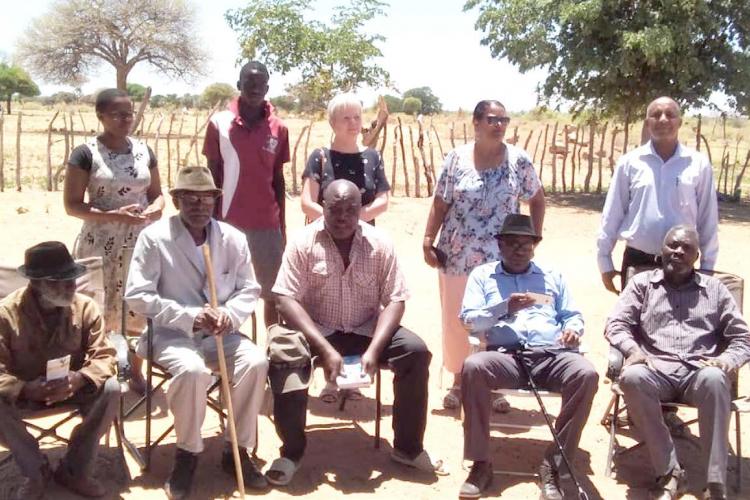 standing, from left: Dr Nkosithando Mpofu; Benito Tjoola; Jeanne Hunter; Prof Sarala Krishnamuthy, and Prof Haileleul Woldemariam, from NUST, pictured on a previous field trip with members of the Ovadhimba community.